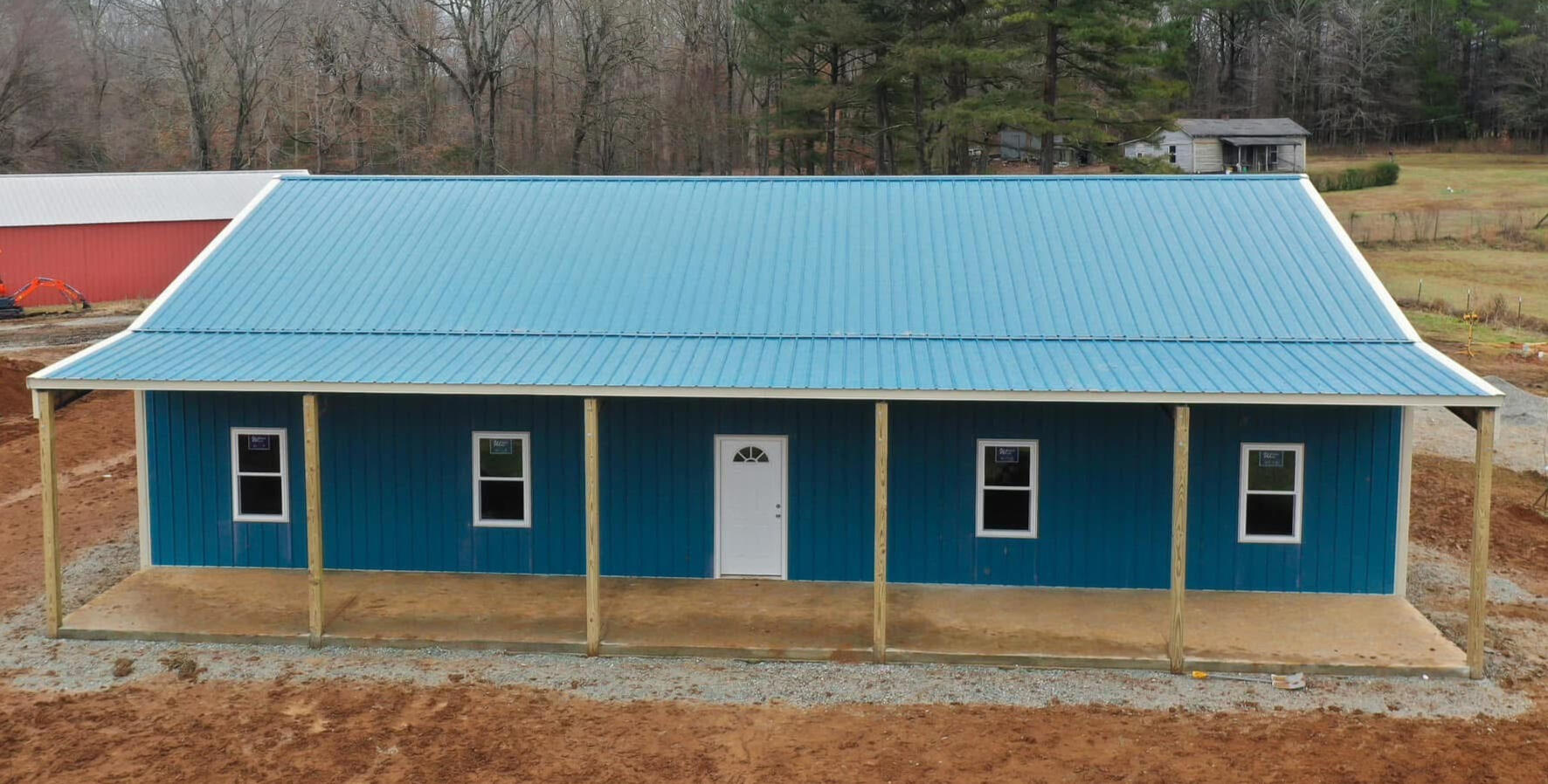 40x60x12 with 10&#39; lean two. Hawaiian Blue siding with Light Stone trim.